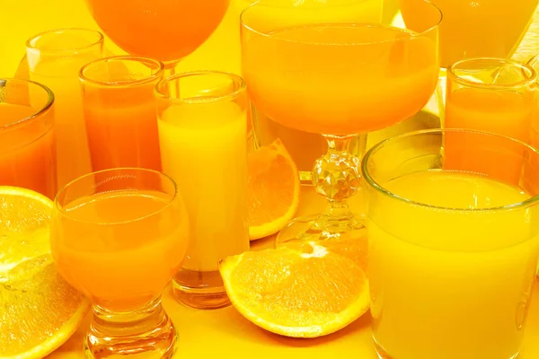 Juice in various shape glasses — Stock Photo, Image