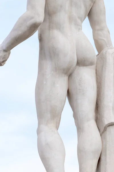 Part of back naked man statue