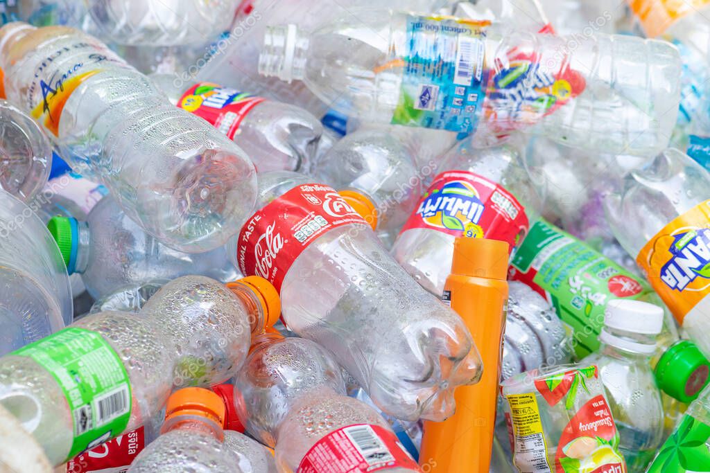 Thailand Bangkok 8 MAR 2020 Plastic pollution concept. Various branded empty soft drinks plastic bottles background