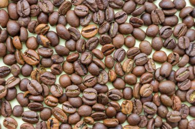 Kavrulmuş kahvenin kahve arka plan olarak. Aroma maddeleri. Doğal sabah içki. Kahve çekirdeği kapatın. Sade kahve. Sabah kavramı. 