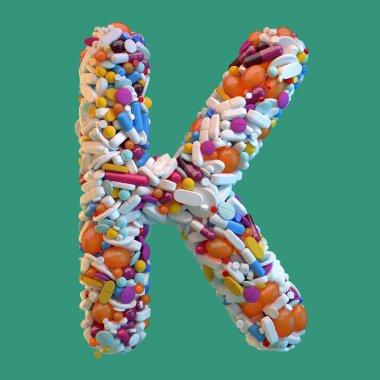 çeşitli ilaçlar tip 3D render alfabe. Yeşil zemin üzerine büyük harf K.