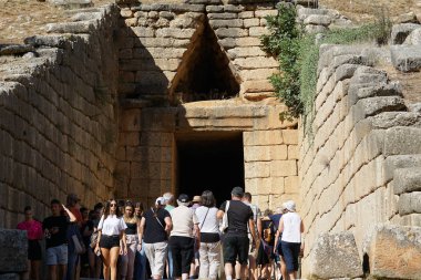Tourists of various nationalities visiting the Treasury of Atreus or Tomb of Agamemnon