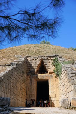 Tourists of various nationalities visiting the Treasury of Atreus or Tomb of Agamemnon