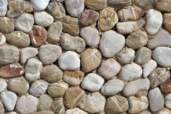 Parede de uma casa feita de pedras — Fotografia de Stock