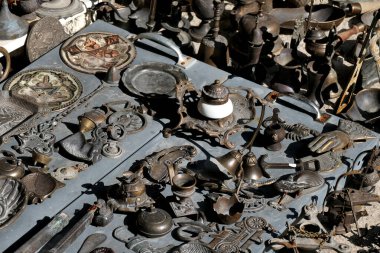 ancient objects of Greek and Arabic origin in an antique shop in the historic center of Ioannina, Epirus