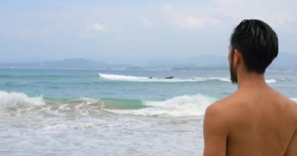 Young Japanese Man Looking Out Beautiful Sea — Stock Video