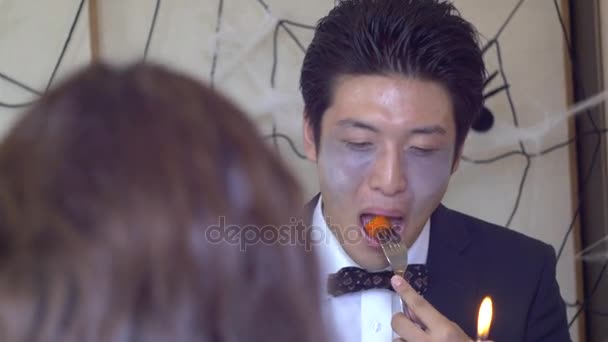 Halloween Dinner Party Handsome Japanese Man Enjoying Food — Stock Video