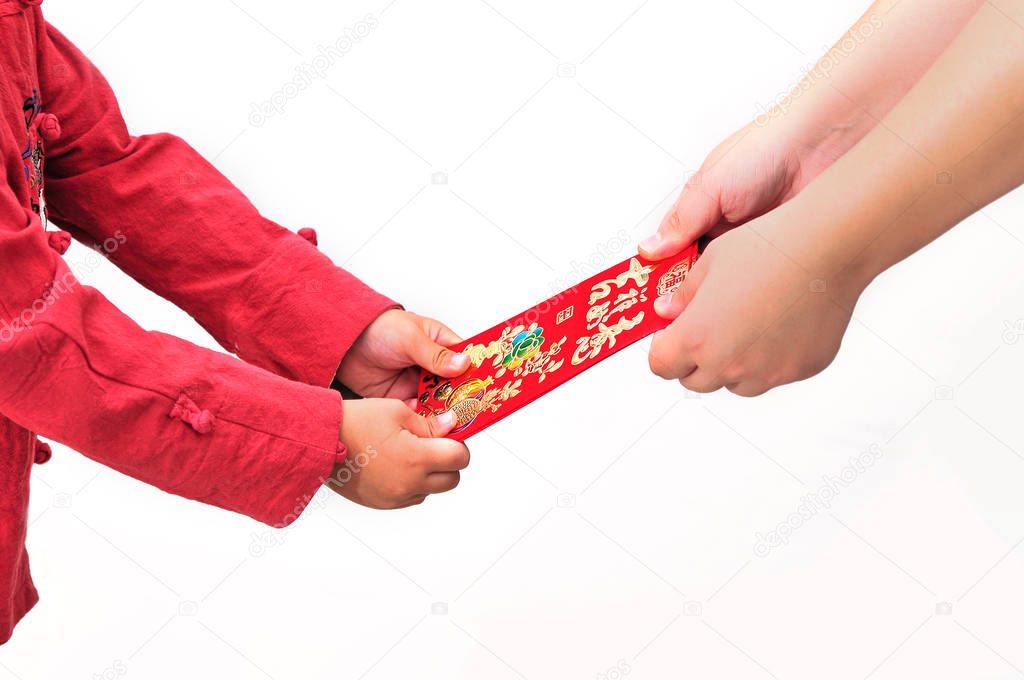 Asian child is holding red packets, Chinese new year concept