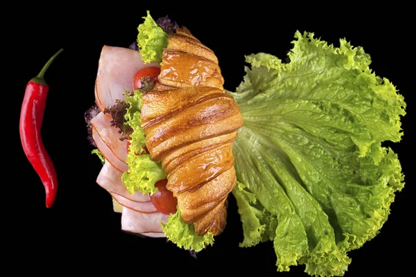 Üstten Görünüm kruvasan jambon ve salata yaprakları