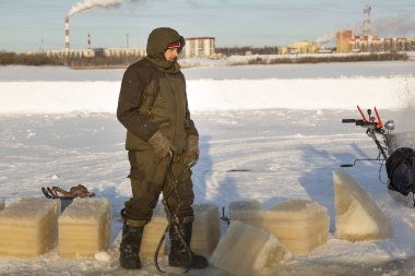 Portrait of a builder with steel tongs and hands