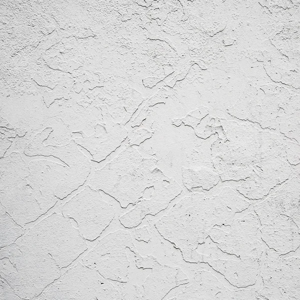 Exfoliated facade paint on a wall.