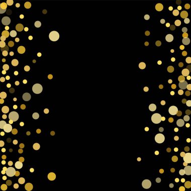 Siyah bir zemin üzerine altın konfeti.