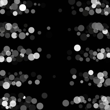  Siyah bir zemin üzerine gümüş glitter konfeti.