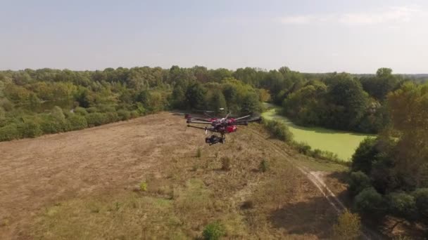 Drone copter UAV - aerial video shooting flying on eight propellers oktocopter. — Stock Video