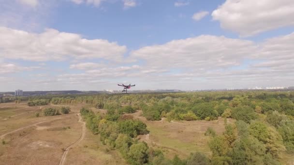 Drone copter UAV - aerial video shooting flying on eight propellers oktocopter. — Stock Video