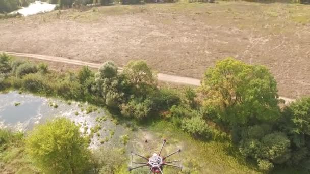 Drone copter UAV - aerial video shooting flying on eight propellers oktocopter. — Stock Video