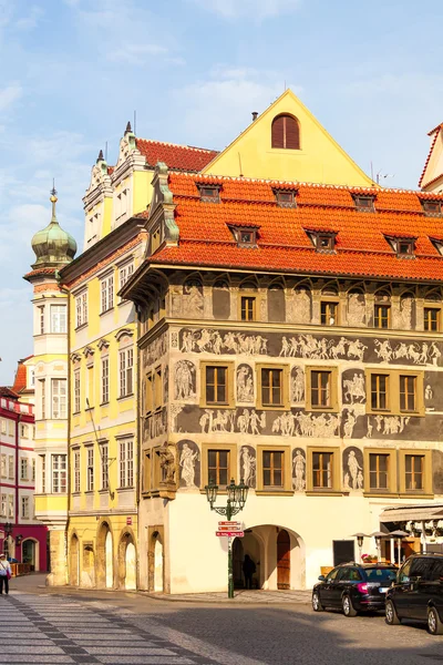 Beautiful painted building on the Old Town Square in Prague
