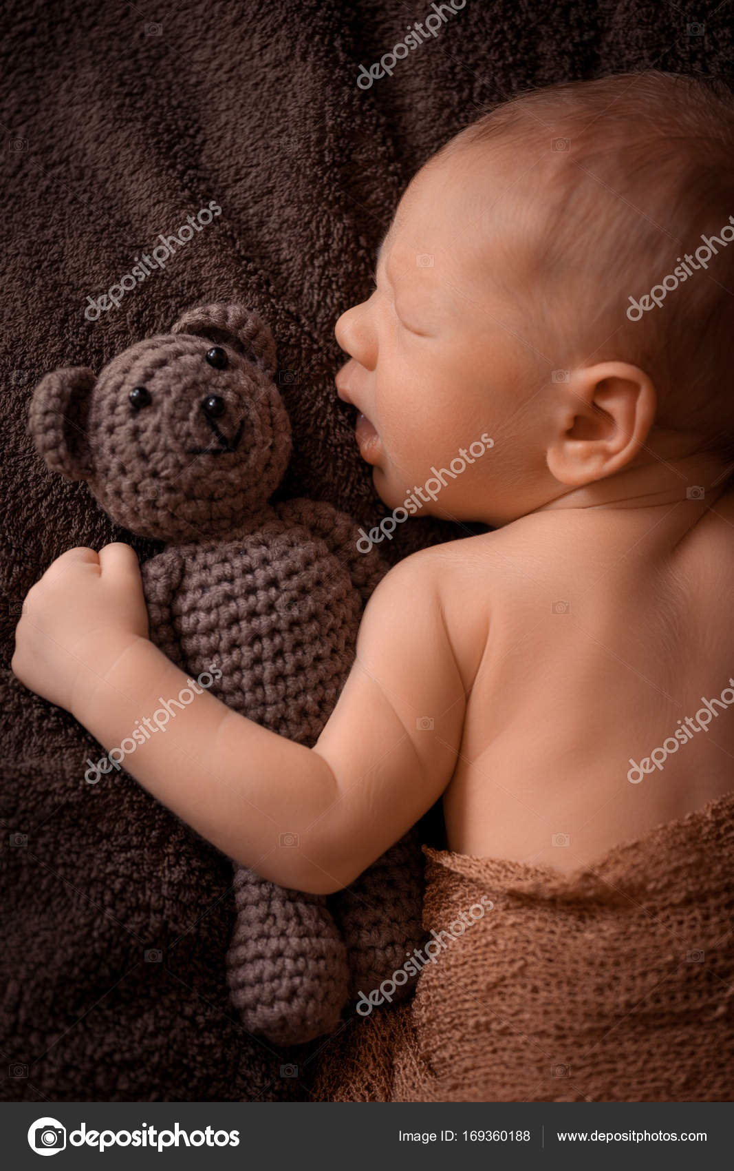 Newborn Baby Sleeping In A Beautiful Pose With A Little Bear Stock Photo Image By C Seregalsv