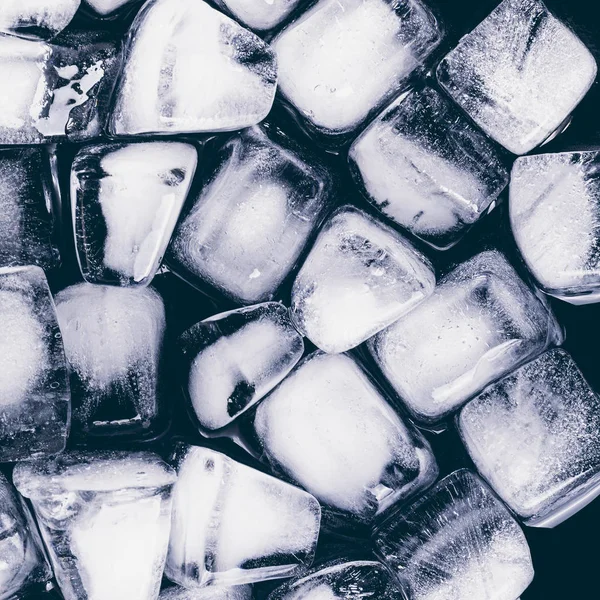 Texture of ice cubes on a dark background — Stock Photo, Image