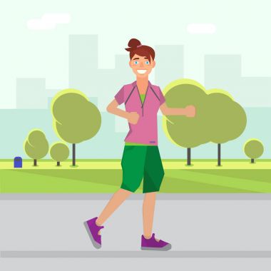 Kadın parkta koşuyor.