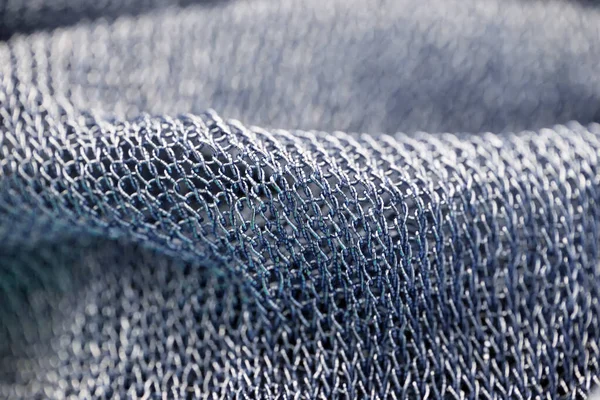 beautiful fabric in the form of a gold mesh that looks like chain mail