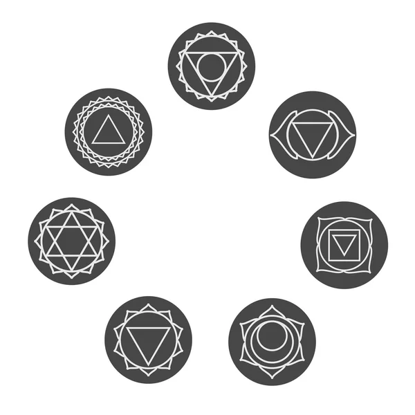 Conjunto de siete iconos de chakras. Símbolos de los centros de energía. Yoga y — Vector de stock