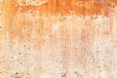 Duvar arka plan, çatlaklar ile duvar eski turuncu çimento çimento.