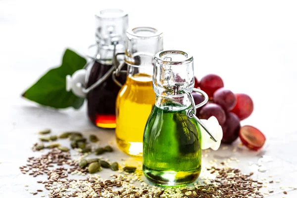 Different Types Vegetable Oil Glass Bottles Sesame Linseed Grape Oil — ストック写真