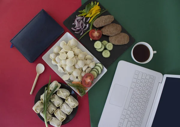 ready meal to eat laptop and note book business style food photography
