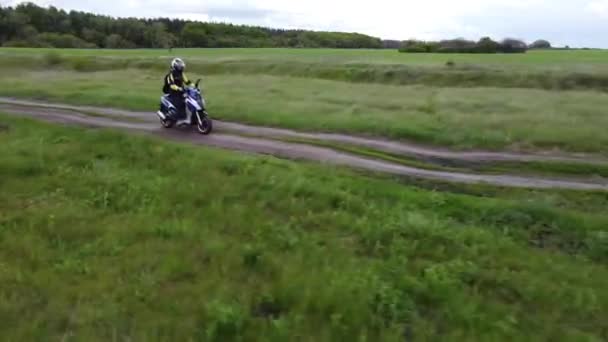 Girl Riding Moto Scooter Motorcycle Dirt Road Fields Aerial Drone — Stock Video