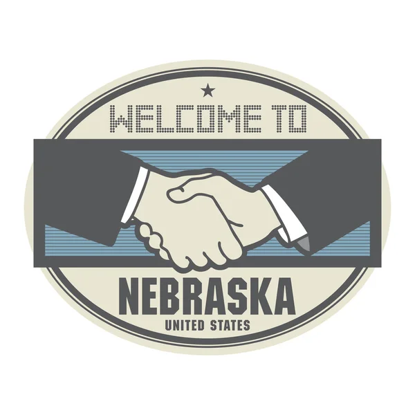 Bedrijfsconcept met handdruk en de tekst welkom in Nebraska — Stockvector