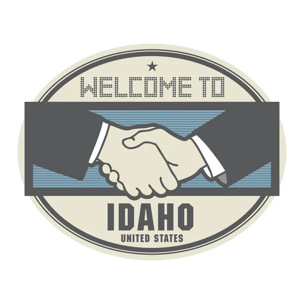 Affärsidén med handslag och texten Välkommen till Idaho, U — Stock vektor