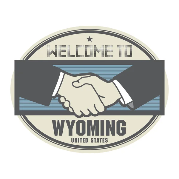 Conceito de negócio com aperto de mão e texto Bem-vindo ao Wyoming , — Vetor de Stock