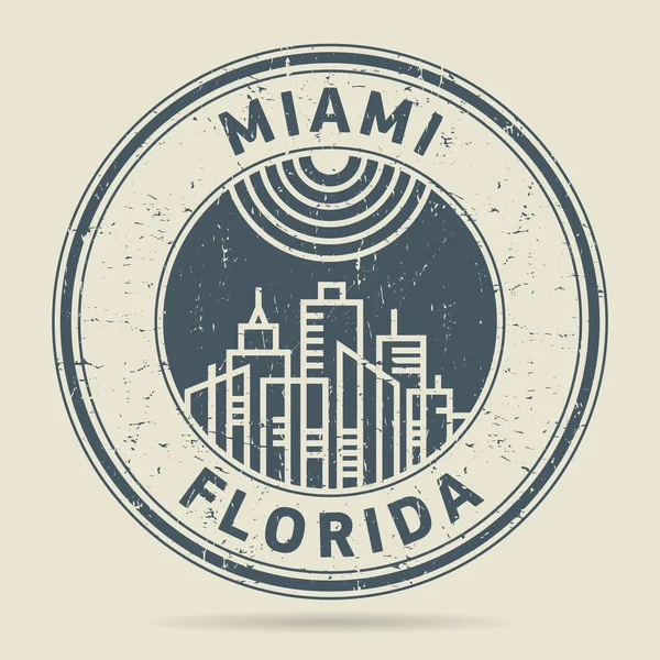 Grunge tampon en caoutchouc ou une étiquette avec texte Miami, Floride — Image vectorielle