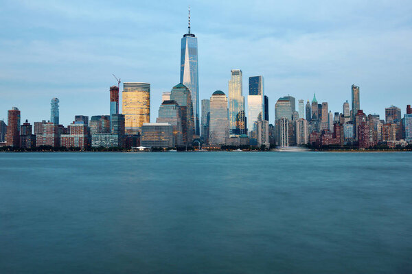 Manhattan Skyline over Hudson river, at dusk, New York City
