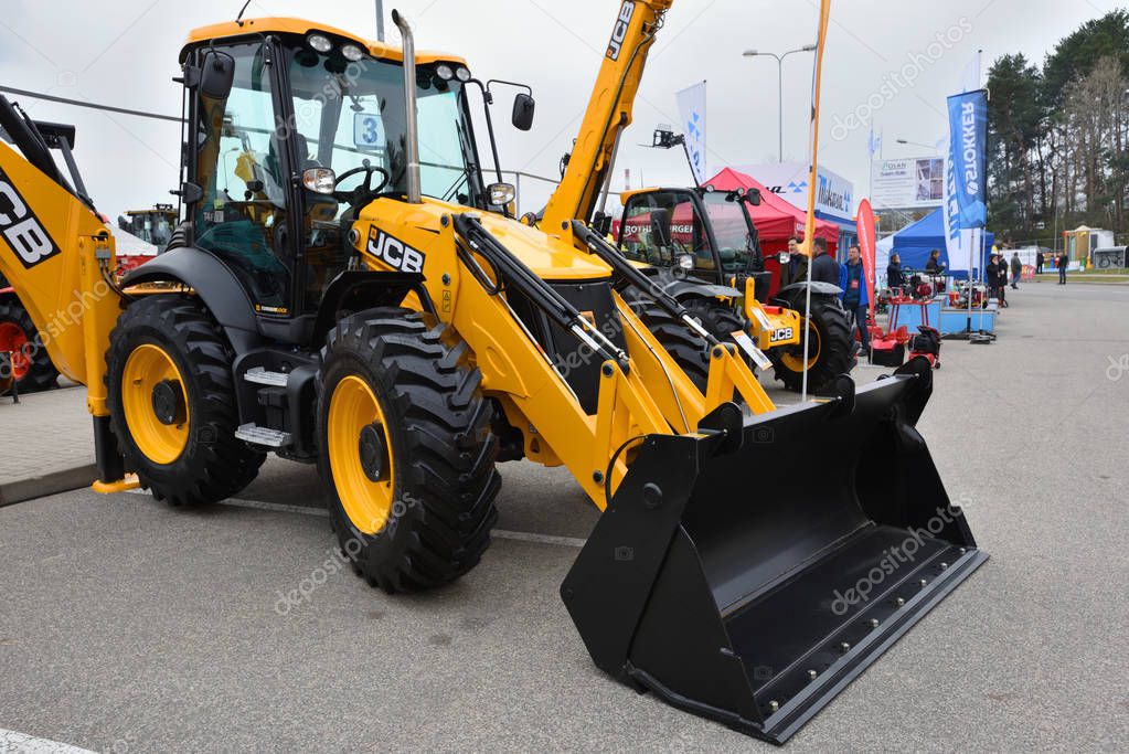 VILNIUS, LITHUANIA - APRIL 27: JCB heavy duty equipment vehicle and logo on April 27, 2017 in Vilnius, Lithuania. JCB corporation is manufacturing equipment for construction and agriculture.
