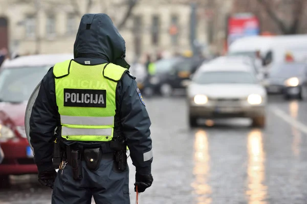 Police officer managing road traffic