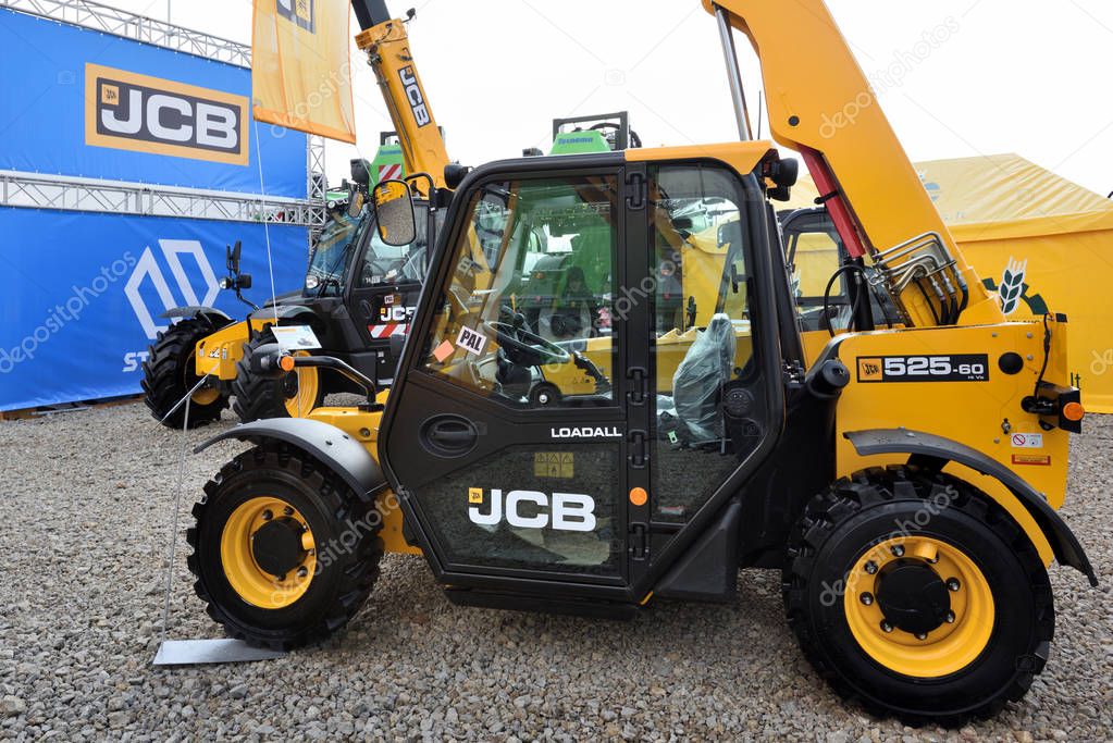 Kaunas, Lithuania - March 23: JCB heavy duty equipment vehicle and logo on March 23, 2018 in Kaunas, Lithuania. JCB corporation is manufacturing equipment for construction and agriculture.