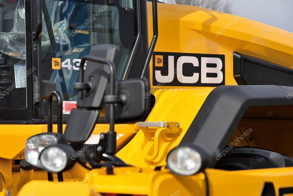 Kaunas, Lithuania - March 23: JCB heavy duty equipment vehicle and logo on March 23, 2018 in Kaunas, Lithuania. JCB corporation is manufacturing equipment for construction and agriculture.
