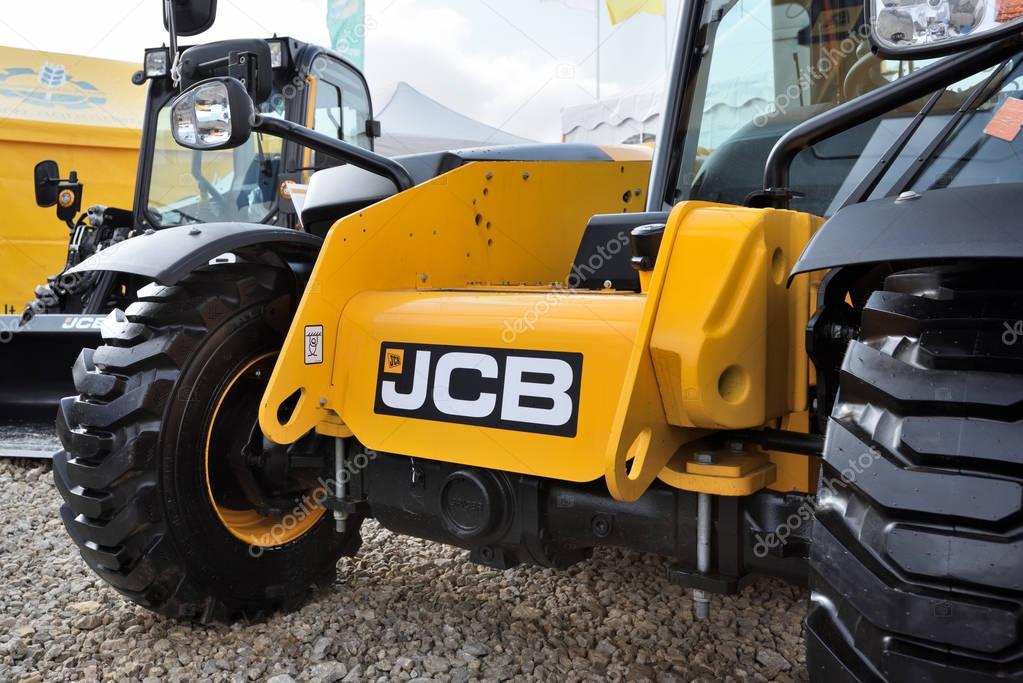 Kaunas, Lithuania - March 23: JCB heavy duty equipment vehicle and logo on March 23, 2018 in Kaunas, Lithuania. JCB corporation is manufacturing equipment for construction and agriculture.
