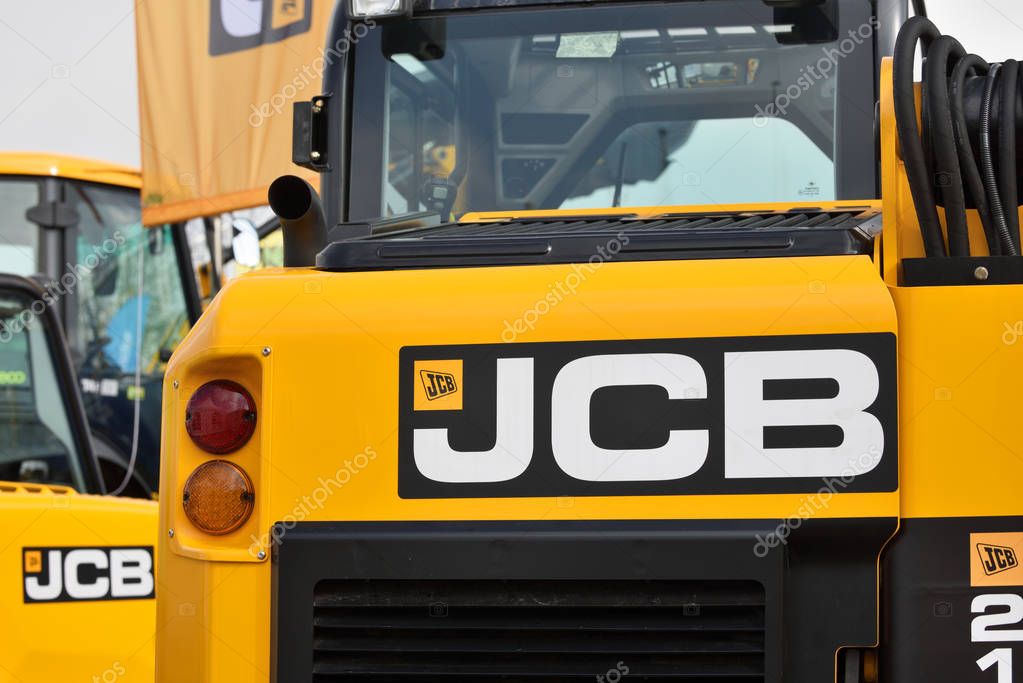 Kaunas, Lithuania - March 23: JCB heavy duty equipment vehicle and logo on March 23, 2018 in Kaunas, Lithuania. JCB corporation is manufacturing equipment for construction and agriculture.