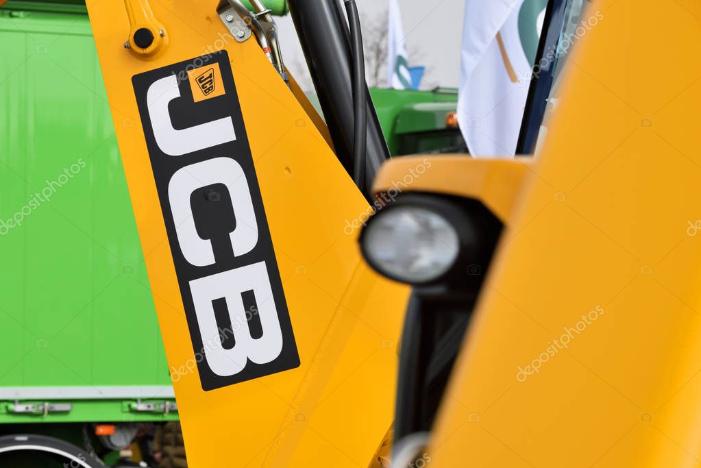 Kaunas, Lithuania - March 23: JCB heavy duty equipment vehicle and logo on March 23, 2018 in Kaunas, Lithuania. JCB corporation is manufacturing equipment for construction and agriculture.