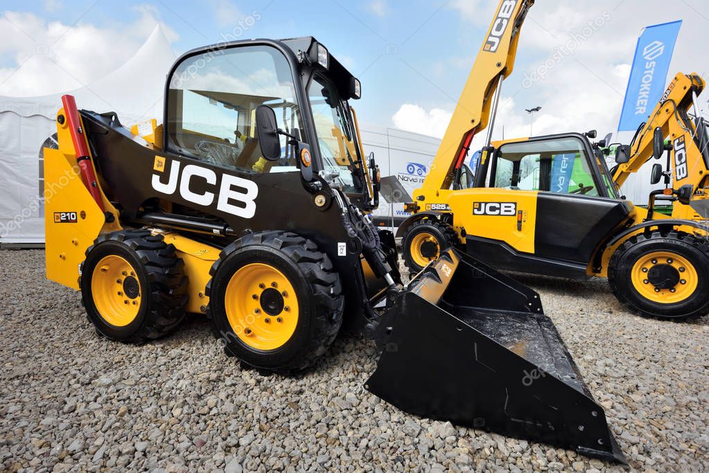 Kaunas, Lithuania - March 23: JCB heavy duty equipment vehicle and logo on March 23, 2018 in Kaunas, Lithuania. JCB corporation is manufacturing equipment for construction and agriculture.