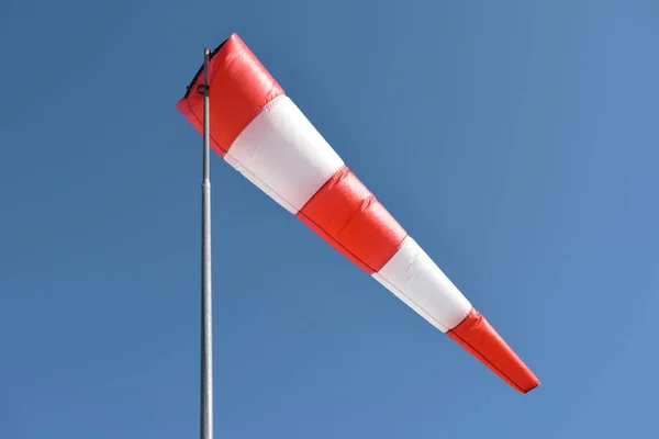 Wind cone against blue sky — Stock Photo, Image