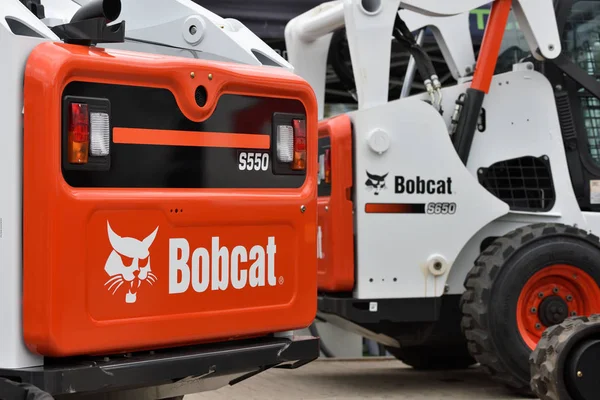 Bobcat ağır ekipman araç ve logosu — Stok fotoğraf