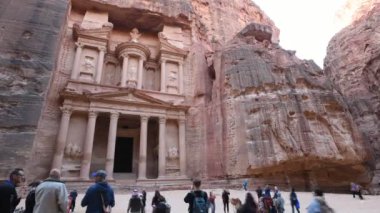 Jordan - February 18, 2020: Unidentified people visit Al Khazneh in the ancient city of Petra, Jordan. Time lapse.