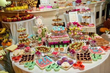 Candy bar with various desserts in a light side
