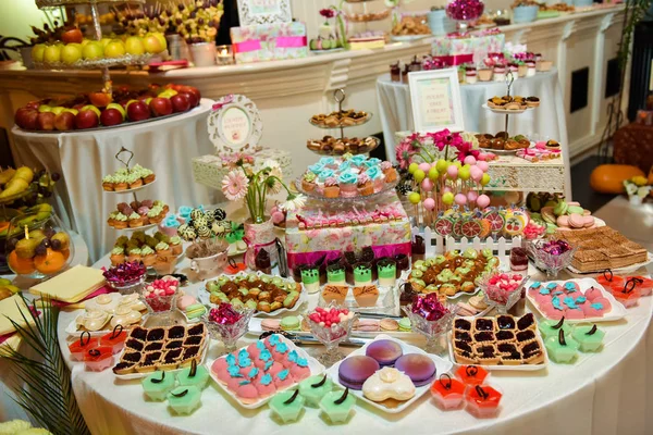 Candy bar with various desserts in a light side — Stok fotoğraf