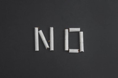 No - an inscription word made from broken cigarettes. To give up smoking clipart