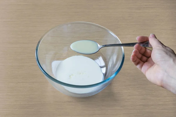 Condensed milk on a spoon